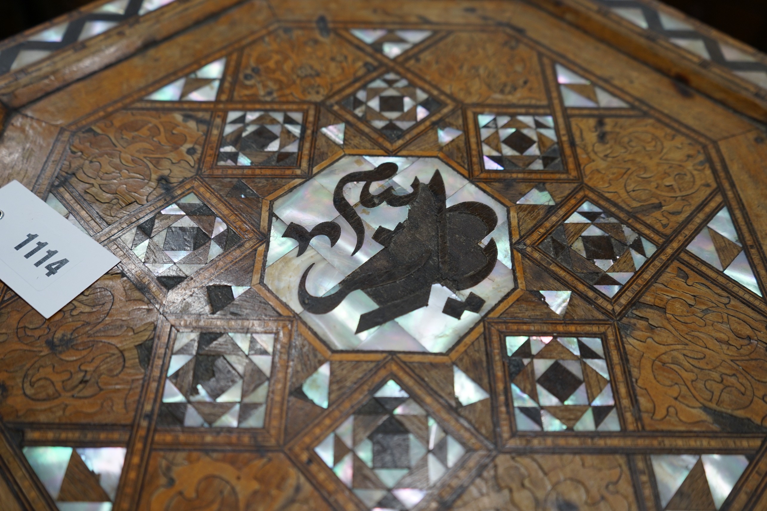 A Moorish octagonal mother of pearl inlaid centre table, width 46cm, height 62cm